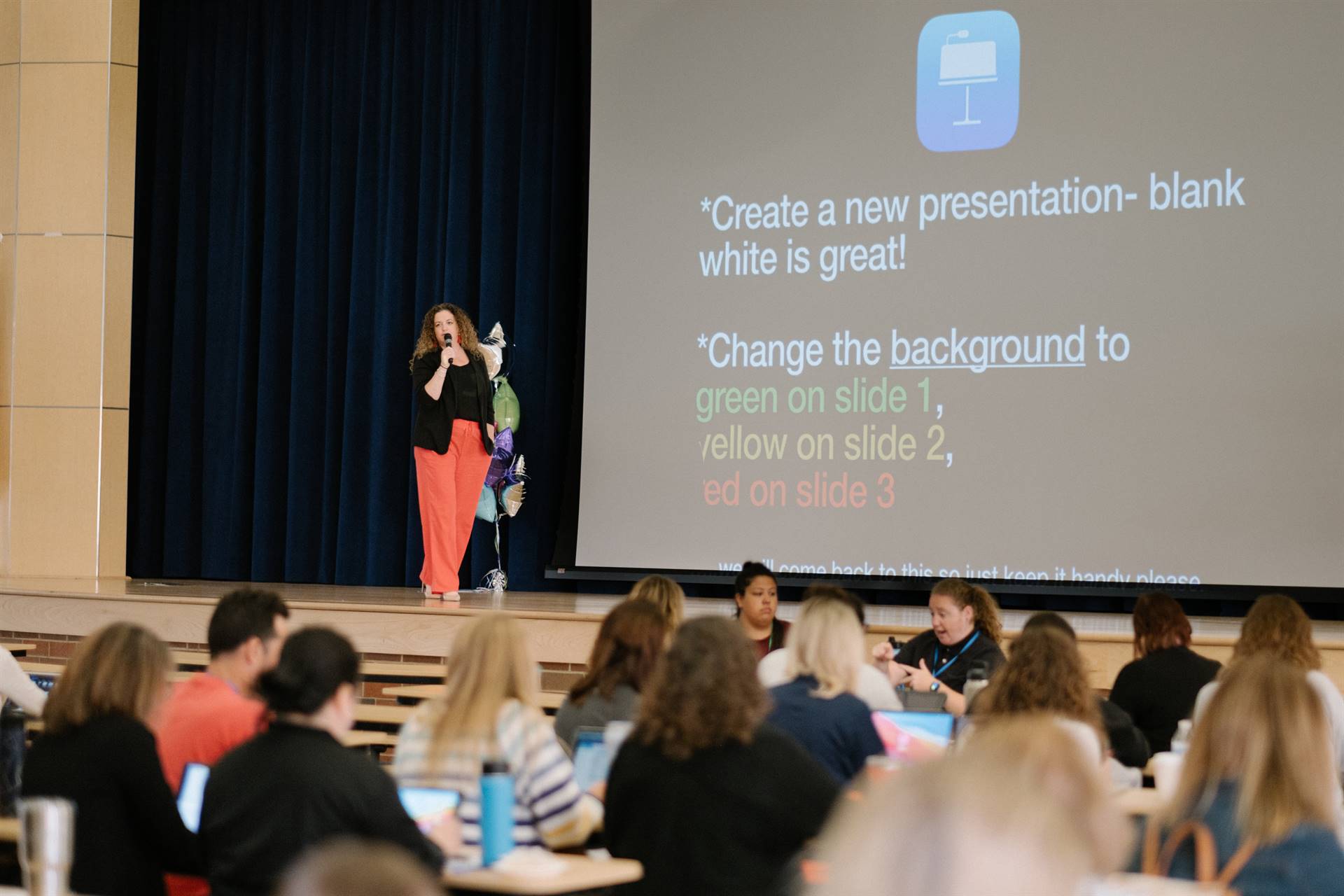 Presenter gives tips on creating a presentation