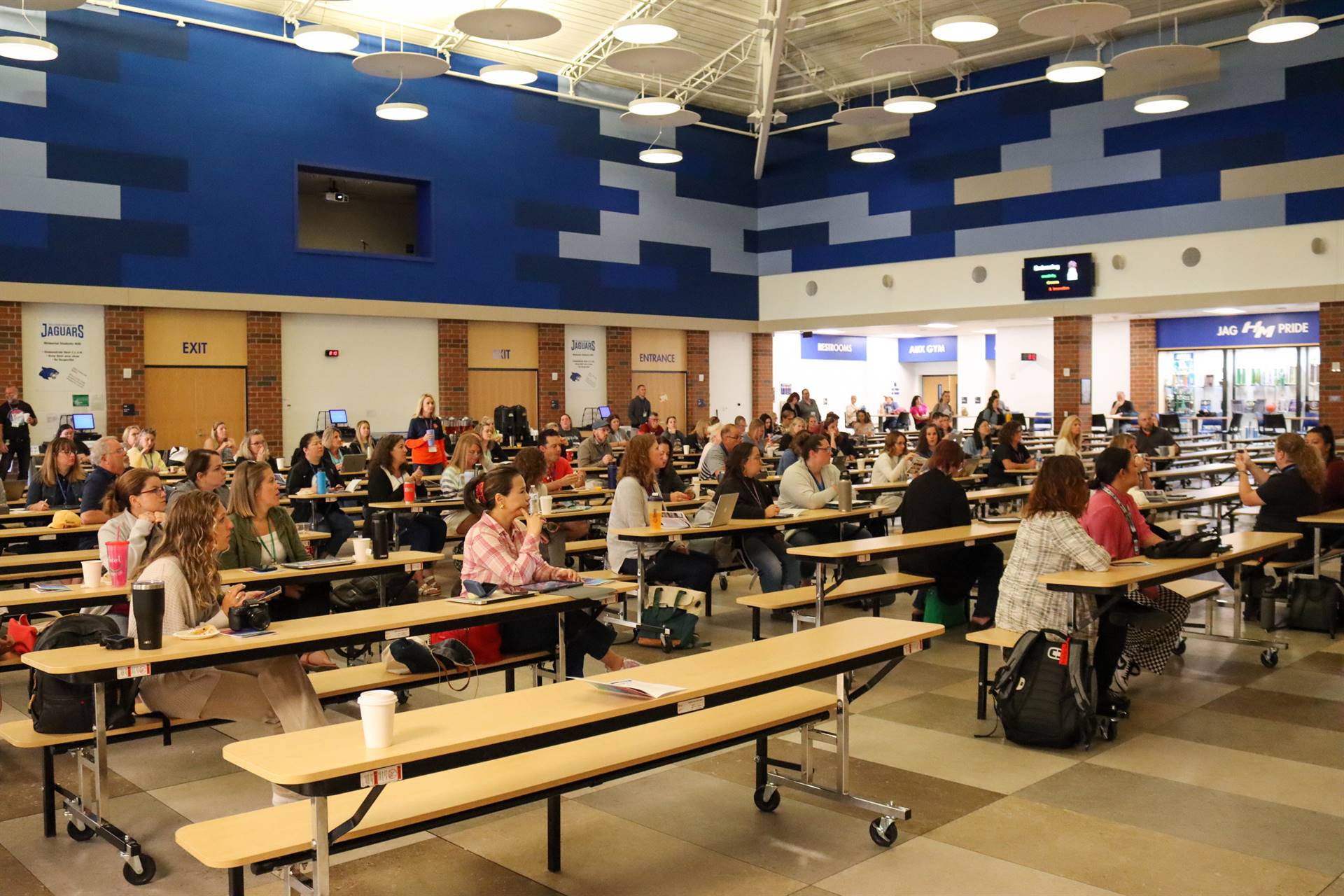 Large group of symposium attendees